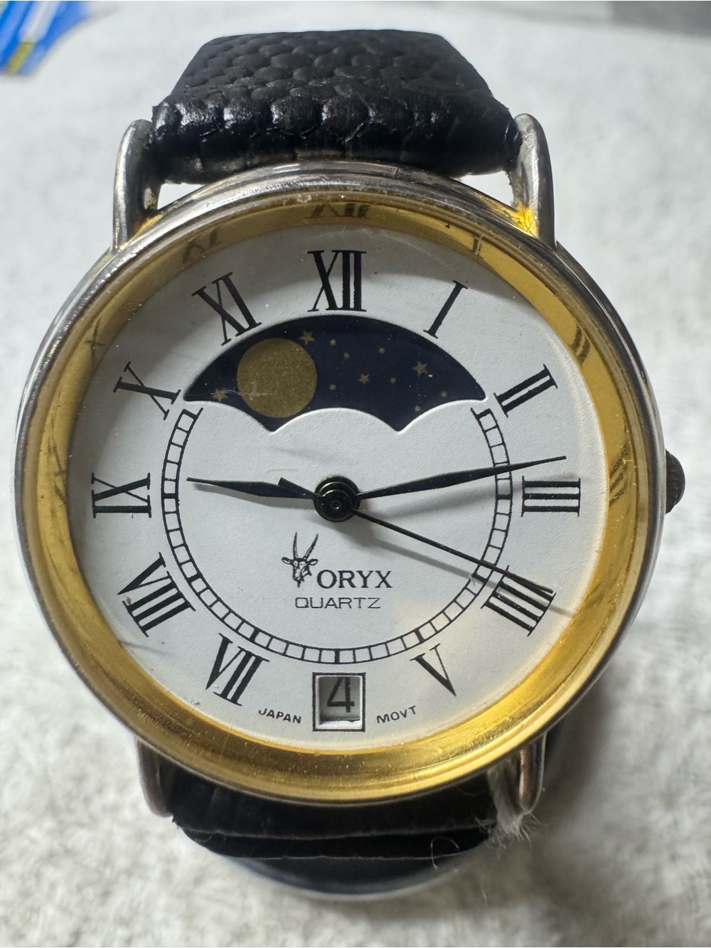 Oryx Men’s Gold-Tone Moonphase Quartz Watch - Black Strap